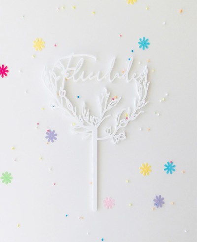 Vista superior cake topper con hojitas