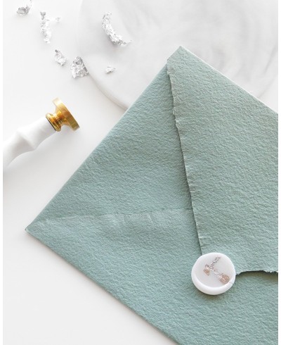 Decorated stamp on handmade envelope