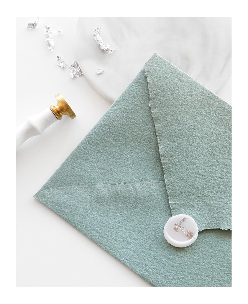 Decorated stamp on handmade envelope